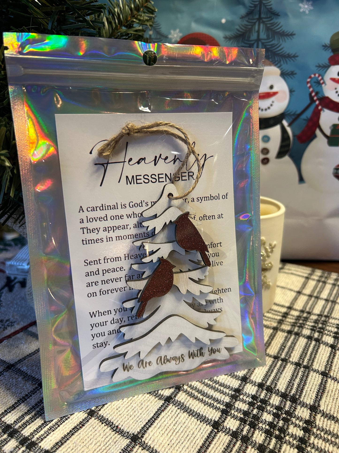 Ornament in a holographic bag with a message card.