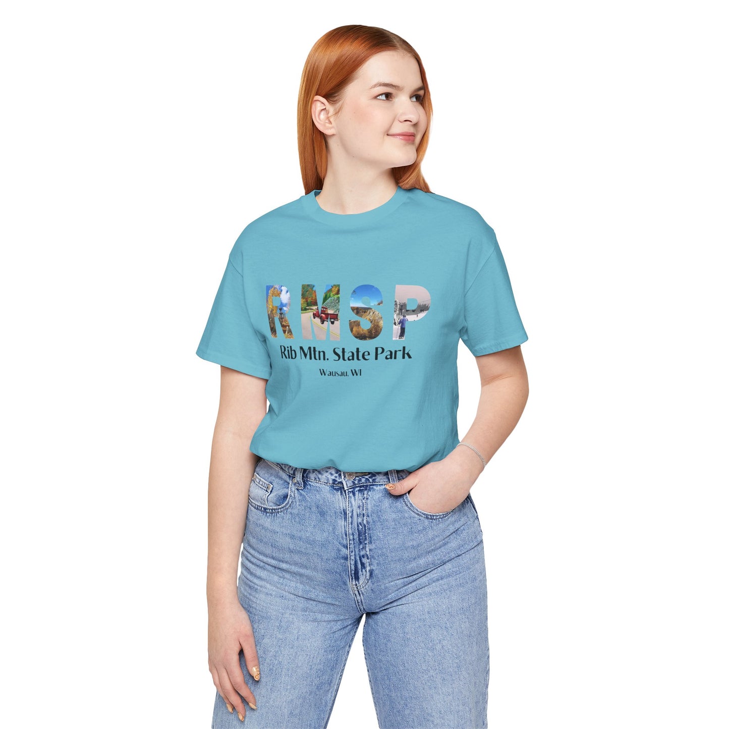 Female model wearing a tourquise RMSP shirt depicting the letters RMSP, each with a different park scene.