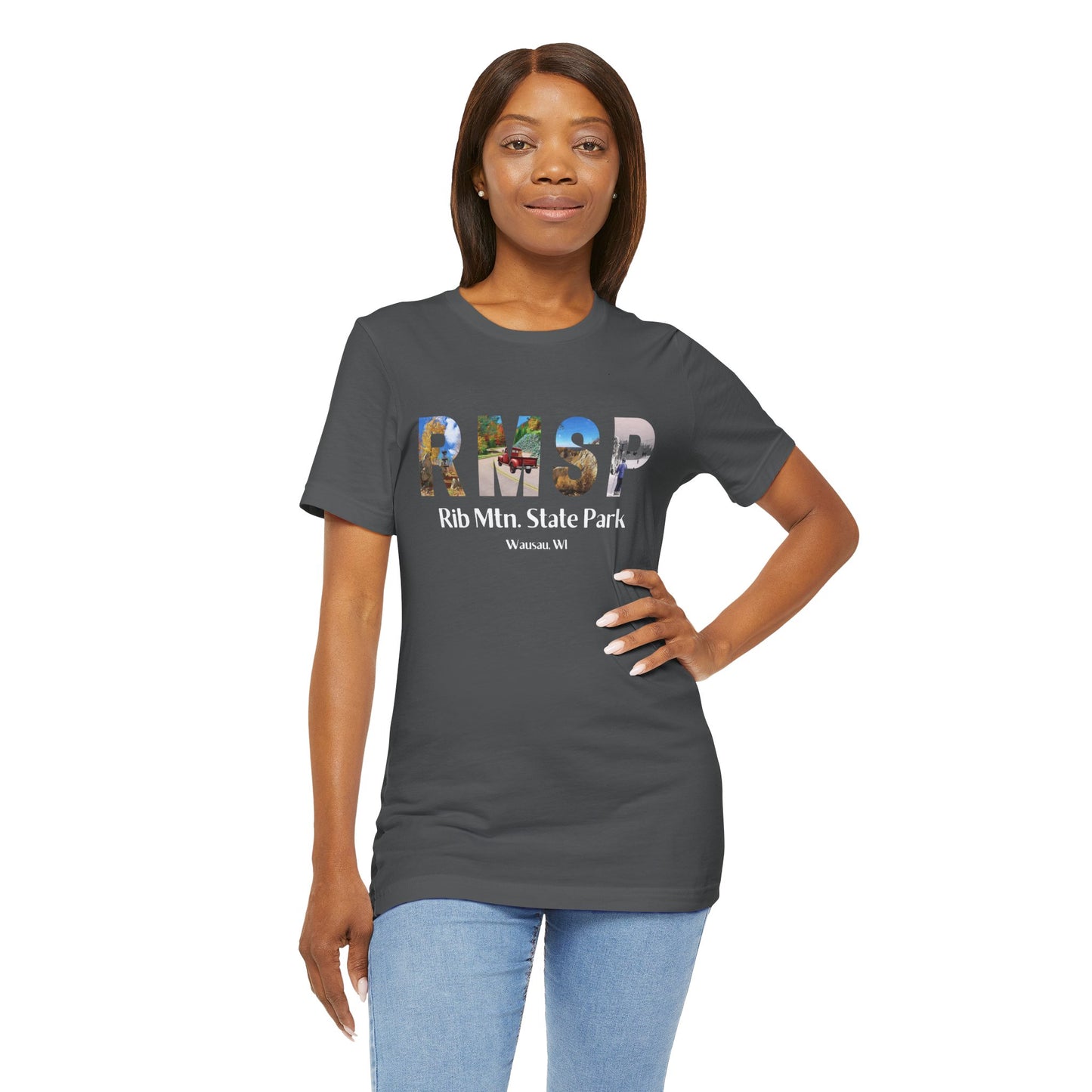 Female model wearing an asphalt colored RMSP shirt depicting the letters RMSP, each with a different park scene.