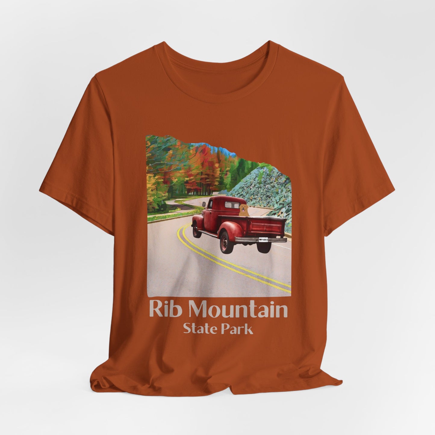 Autumn colored T-shirt with vintage truck driving up the road to Rib Mountain State Park during fall leaf color graphic.
