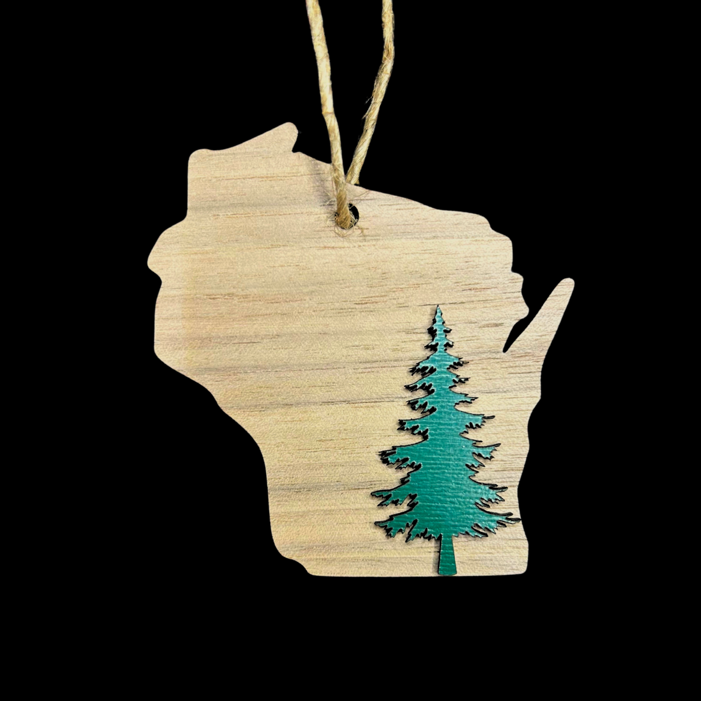 Walnut Wisconsin ornament with a Green tree on black background.