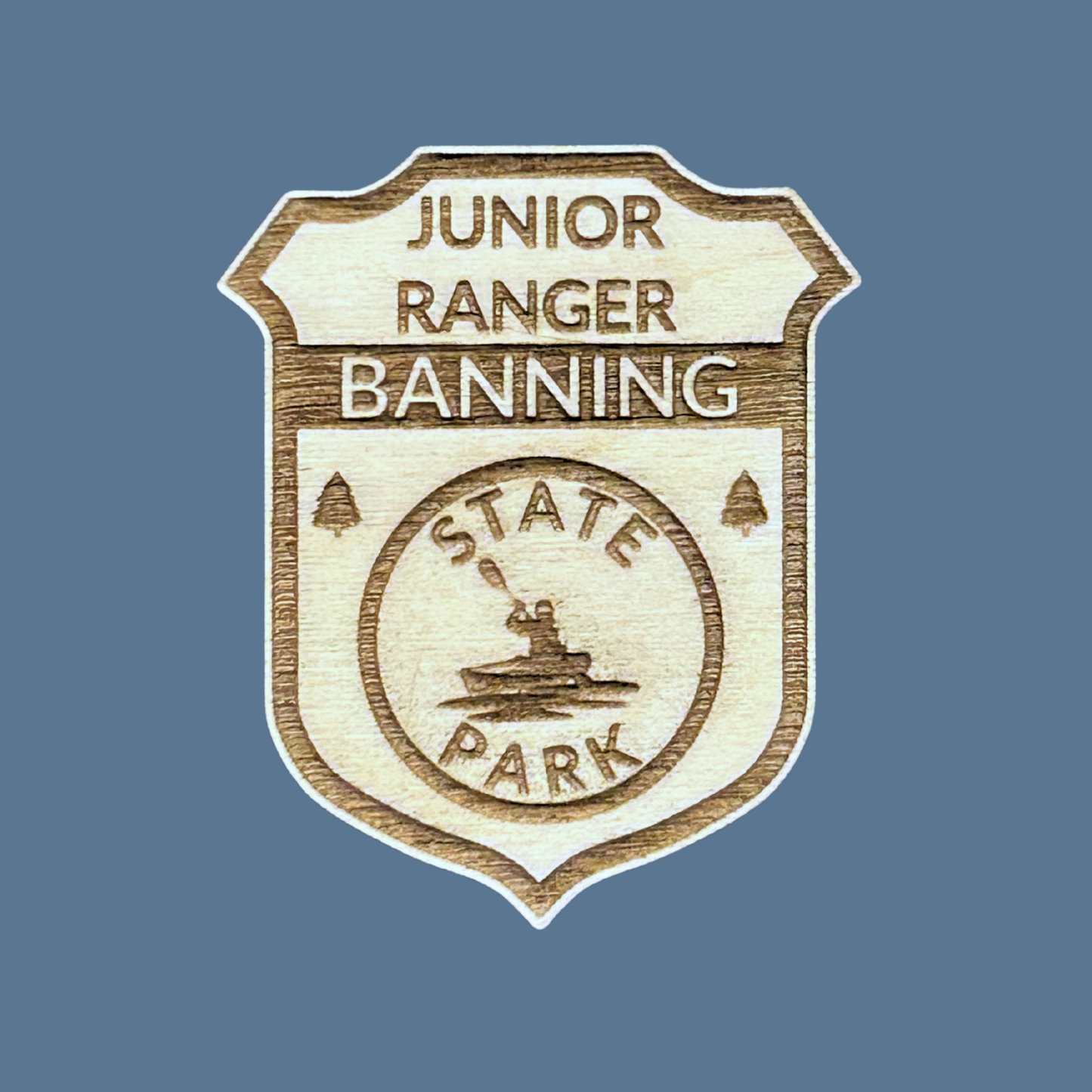 Junior Ranger badge for Banning State Park on a blue background