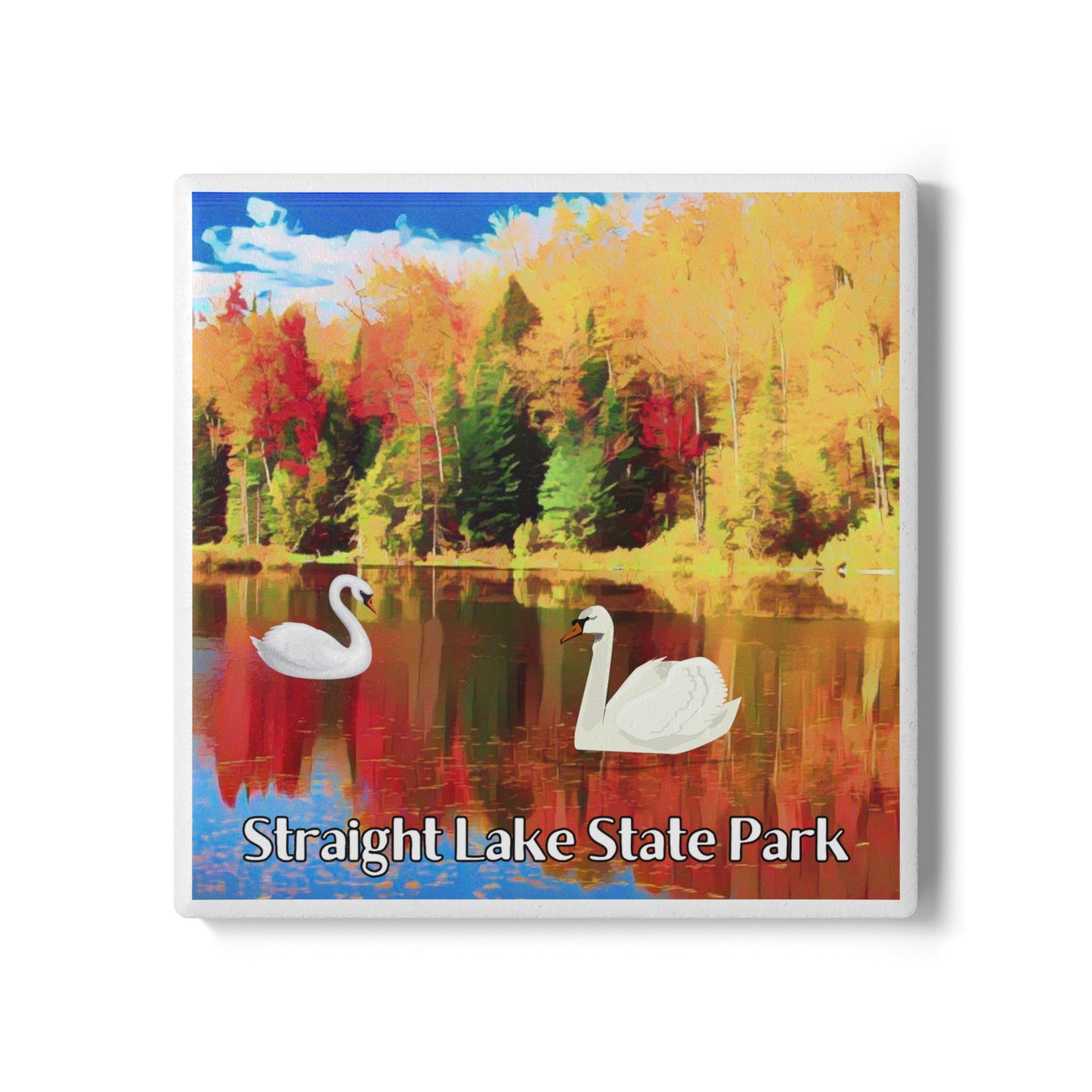 Ceramic coaster featuring two swans on a lake in fall and the text straight lake state park.