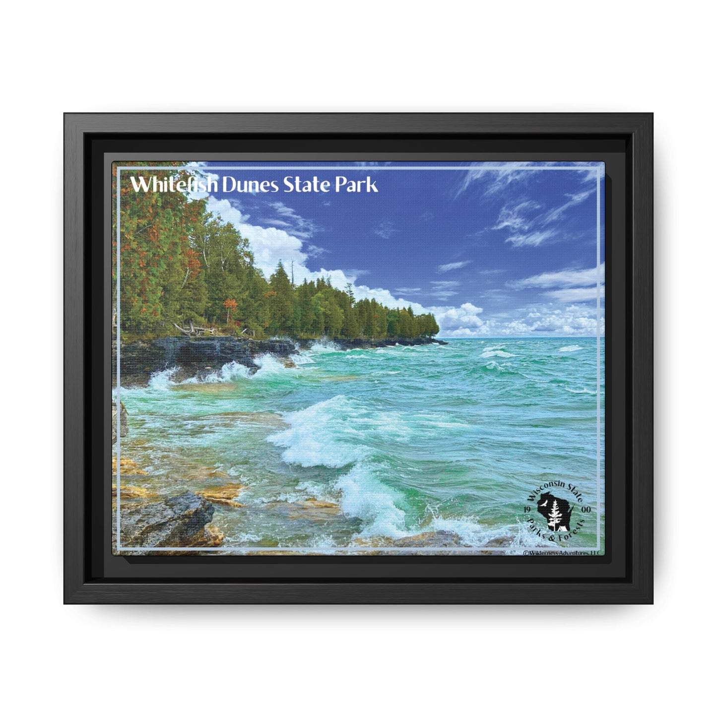 Black framed canvas, print featuring large waves crashing against the rocky Shores of whitefish Dune State Park.