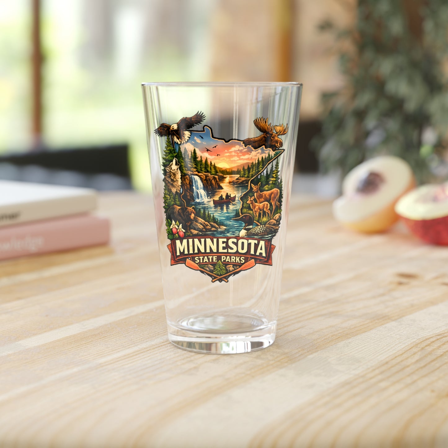 Clear glass with Minnesota State Parks design on a wooden table