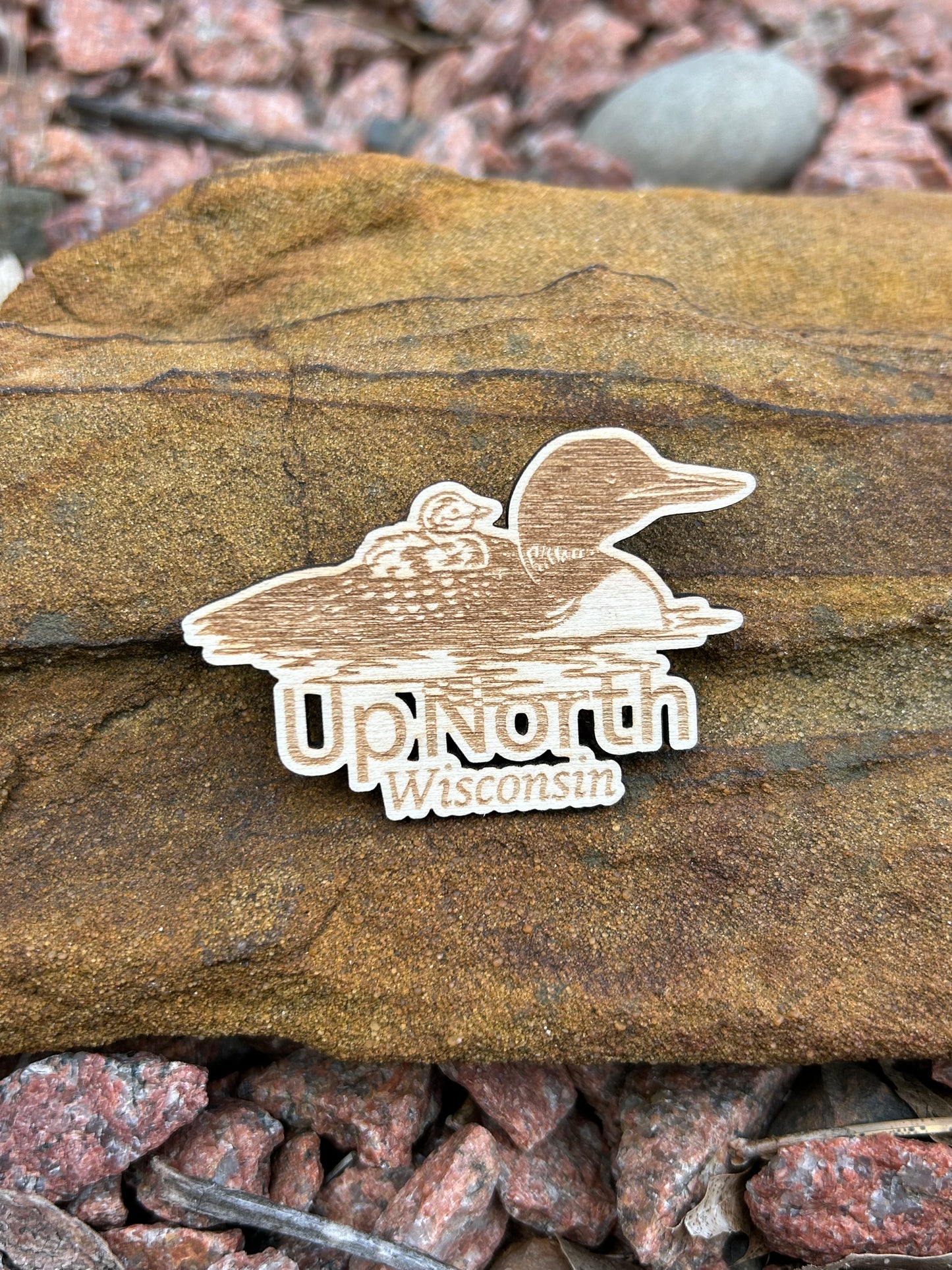 Loon shaped wood magnet with baby loon and the text "up North Wisconsin".