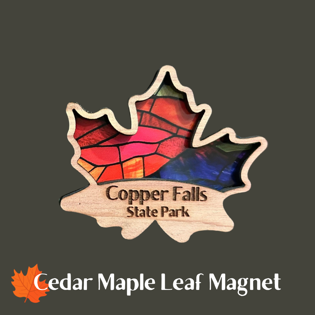 cedar maple leaf shaped magnets with a faux stained glass appearance. Photo Background: solid green with the text: Cedar maple Leaf Magnet.