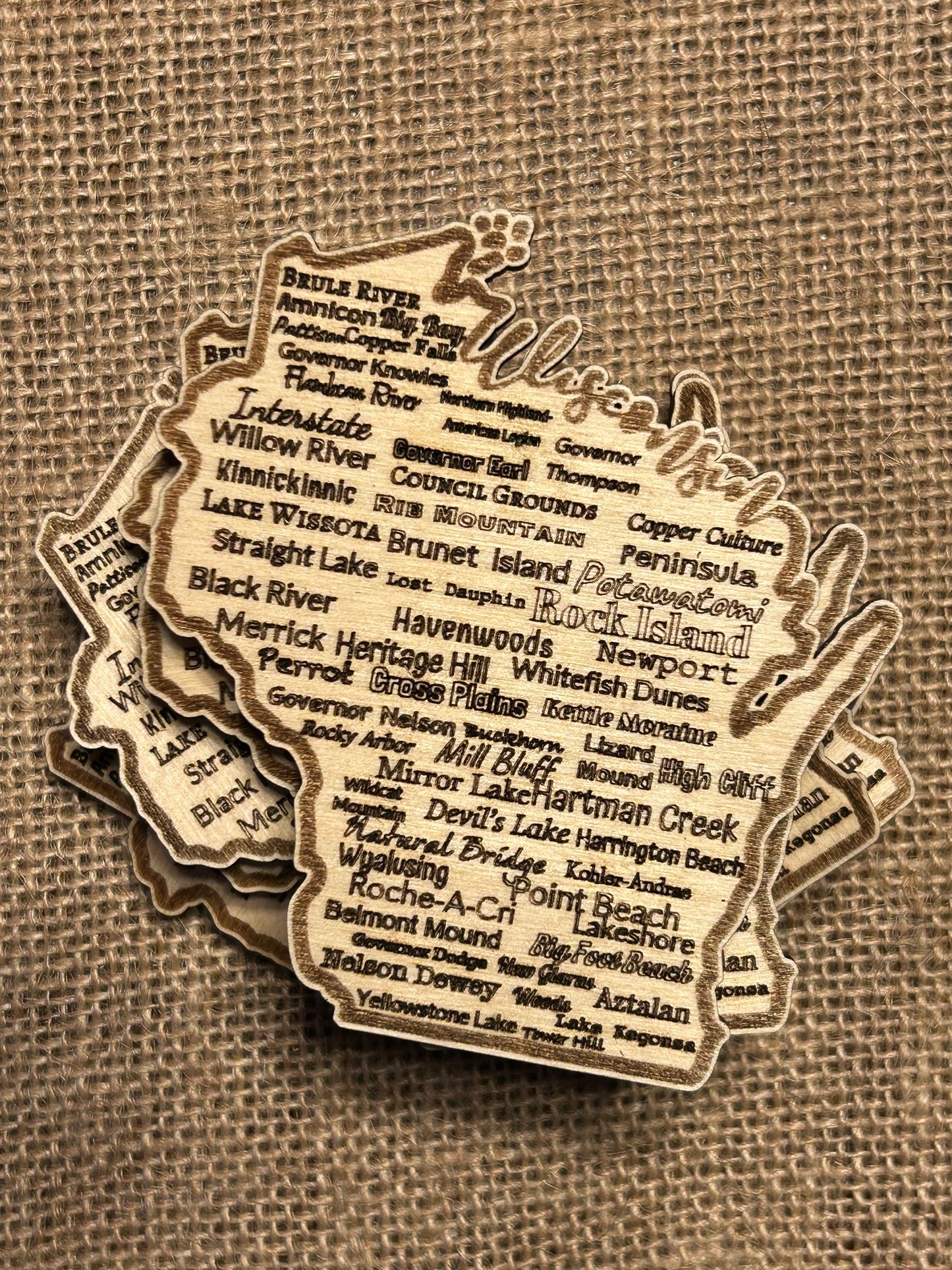 Wisconsin Shaped wood magnet with all of Wisconsin's State parks and forest listed.