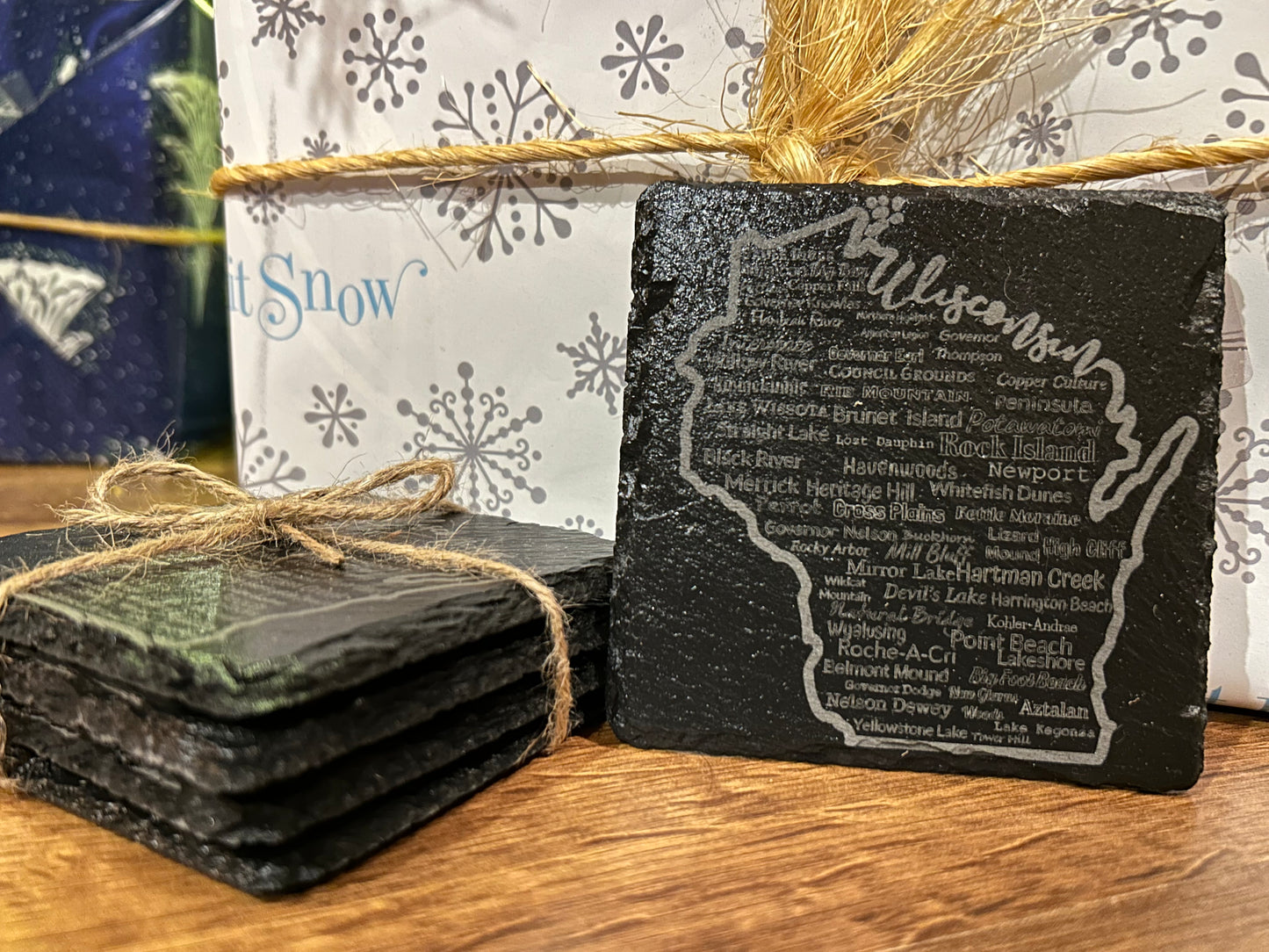 Slate Coaster with Wisconsin Shape and all of Wisconsin's State Parks and forests engraved on the coaster.