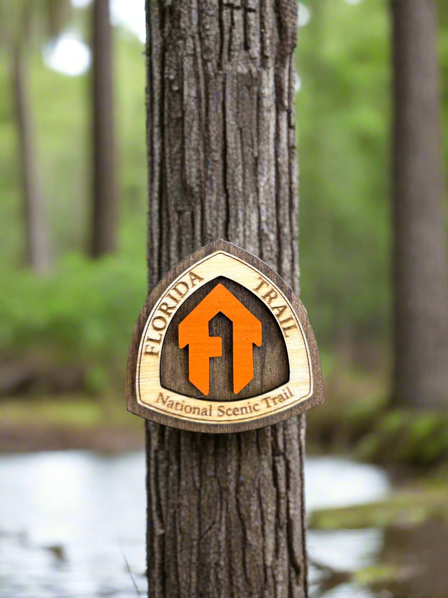 National Trail Symbol with the text "Florida Trail National Scenic Trail" and an orange "FT" symbol.