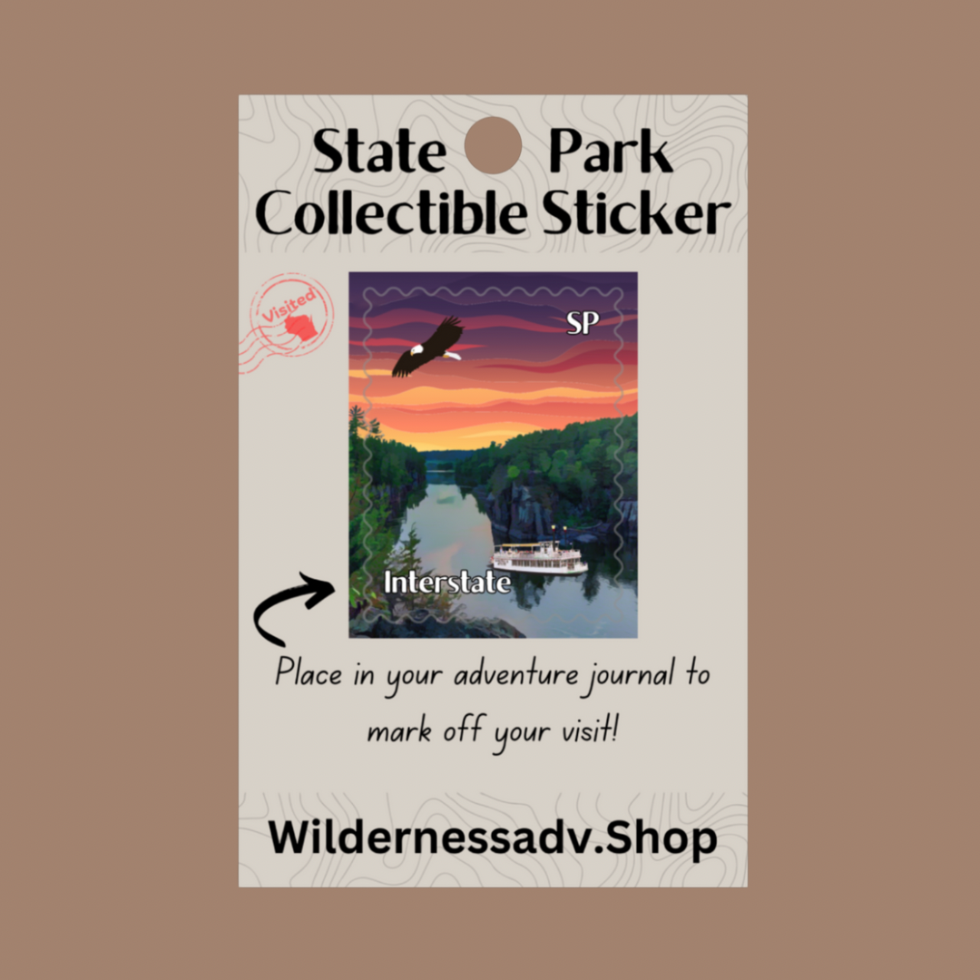 Sticker for Wisconsin State Park Adventure Journal depicting the St. Croix River at sunset with a bald eagle flying in the sky and a paddle wheel boat on the river.