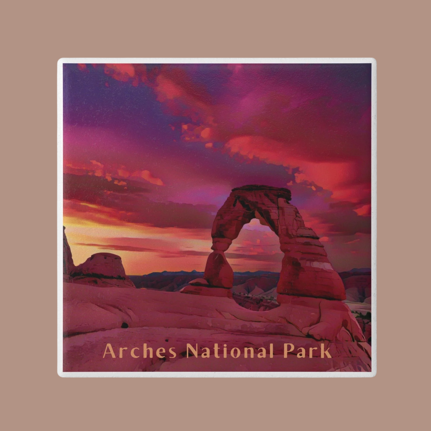 Red sandstone arches with a pink and purple sunset sky at Arches National Park.