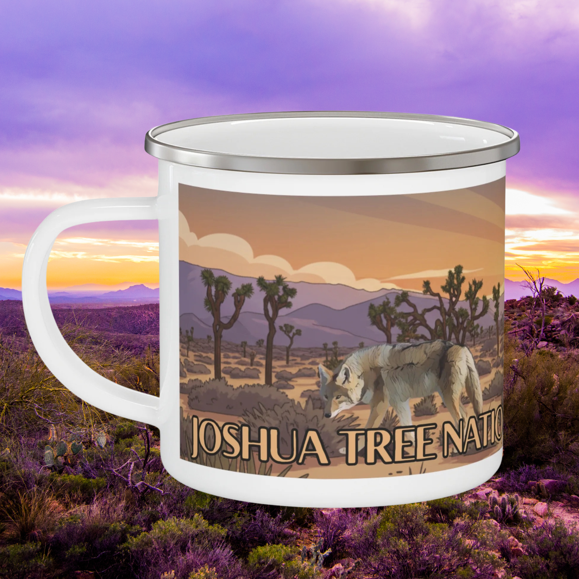 Enamel mug with Joshua Tree National Park design featuring a panoramic desert landscape, Joshua trees, and coyote.