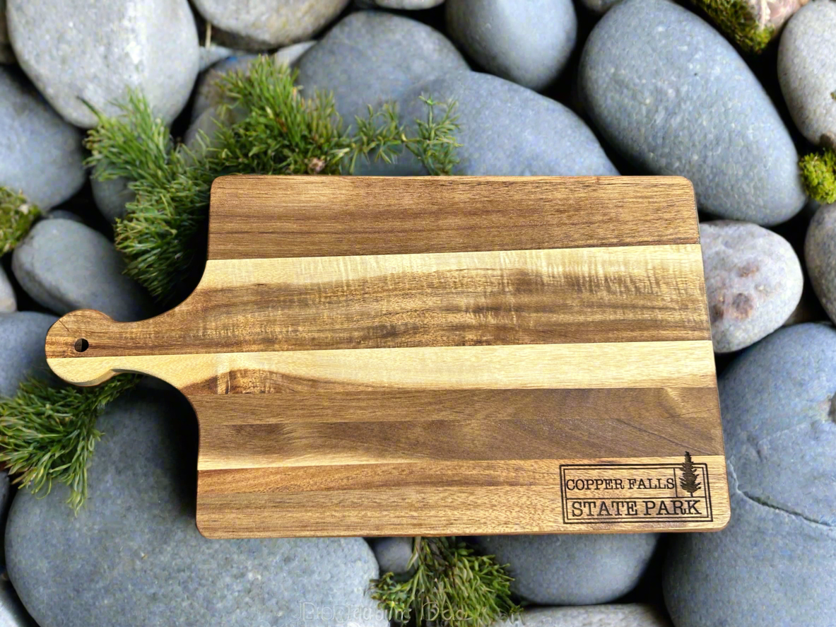 Wood cutting board with Copper Falls State Park Engraving.