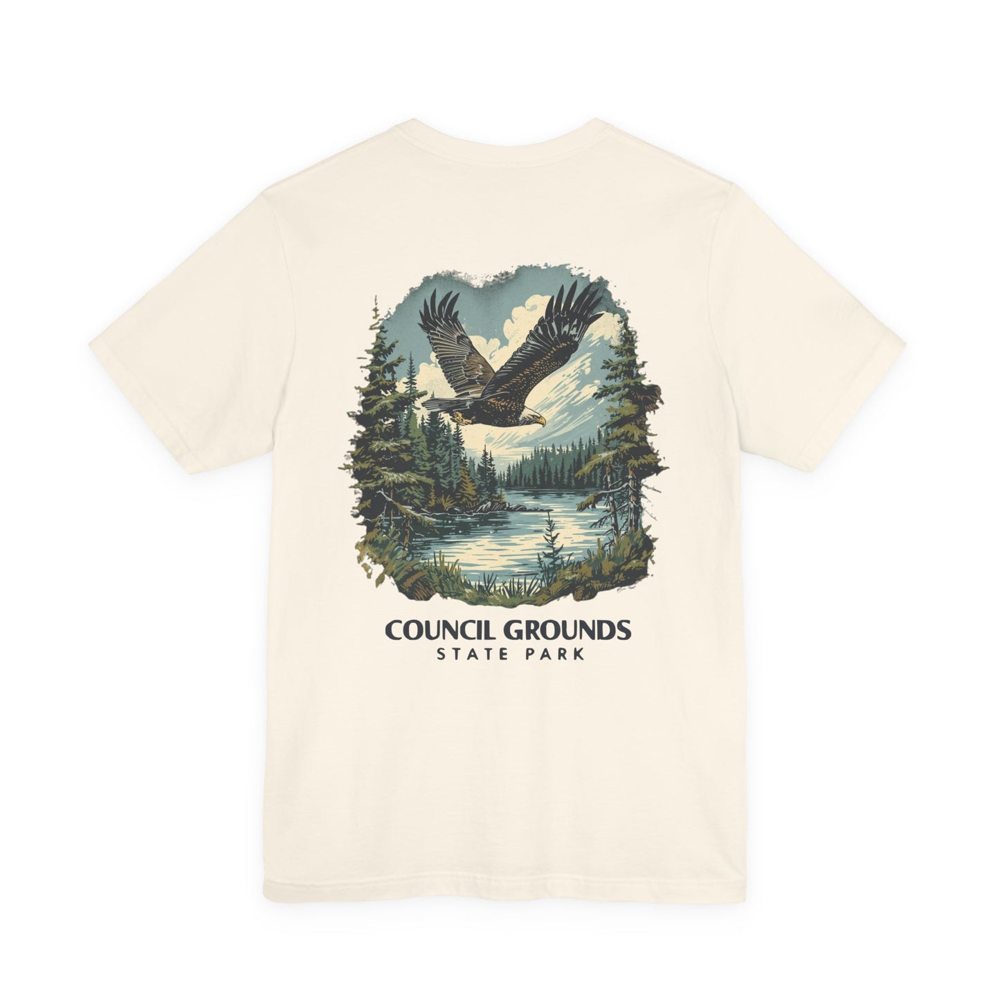 Beige t-shirt with eagle graphic and 'Council Grounds State Park' text on a white background