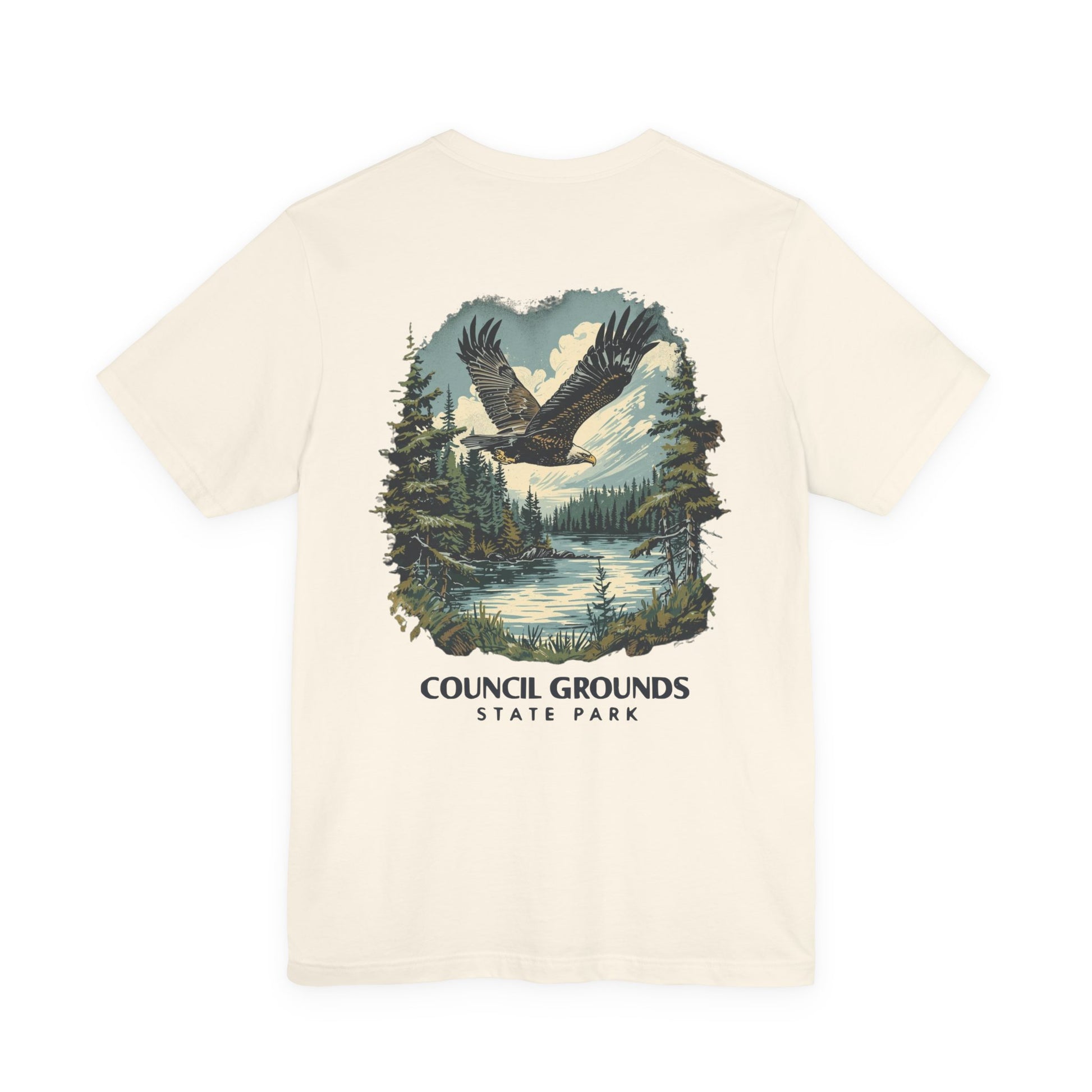 Beige t-shirt with eagle graphic and 'Council Grounds State Park' text on a white background