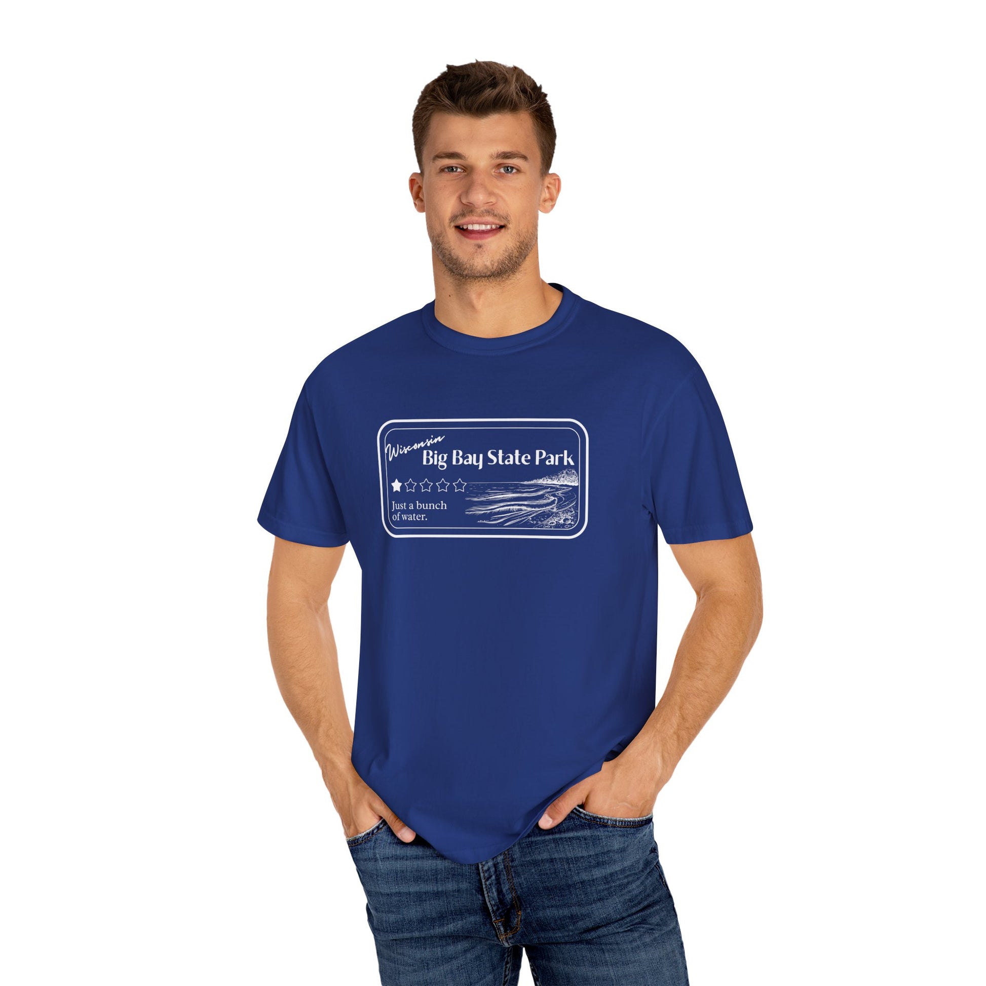 Male model wearing a Navy Colored T-Shirt with 1 star review design of Big Bay State Park.  Features a line art image of a sandy beach and shoreline, 1 star graphic, and the text: “Wisconsin Big Bay State Park, Just a bunch of water.