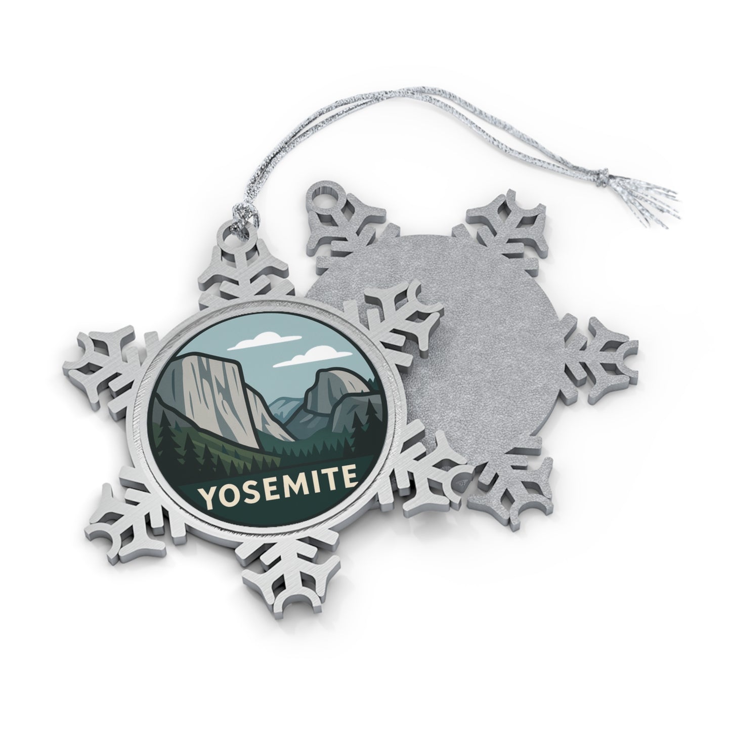 Snowflake-shaped ornament with Yosemite National Park design on a white background