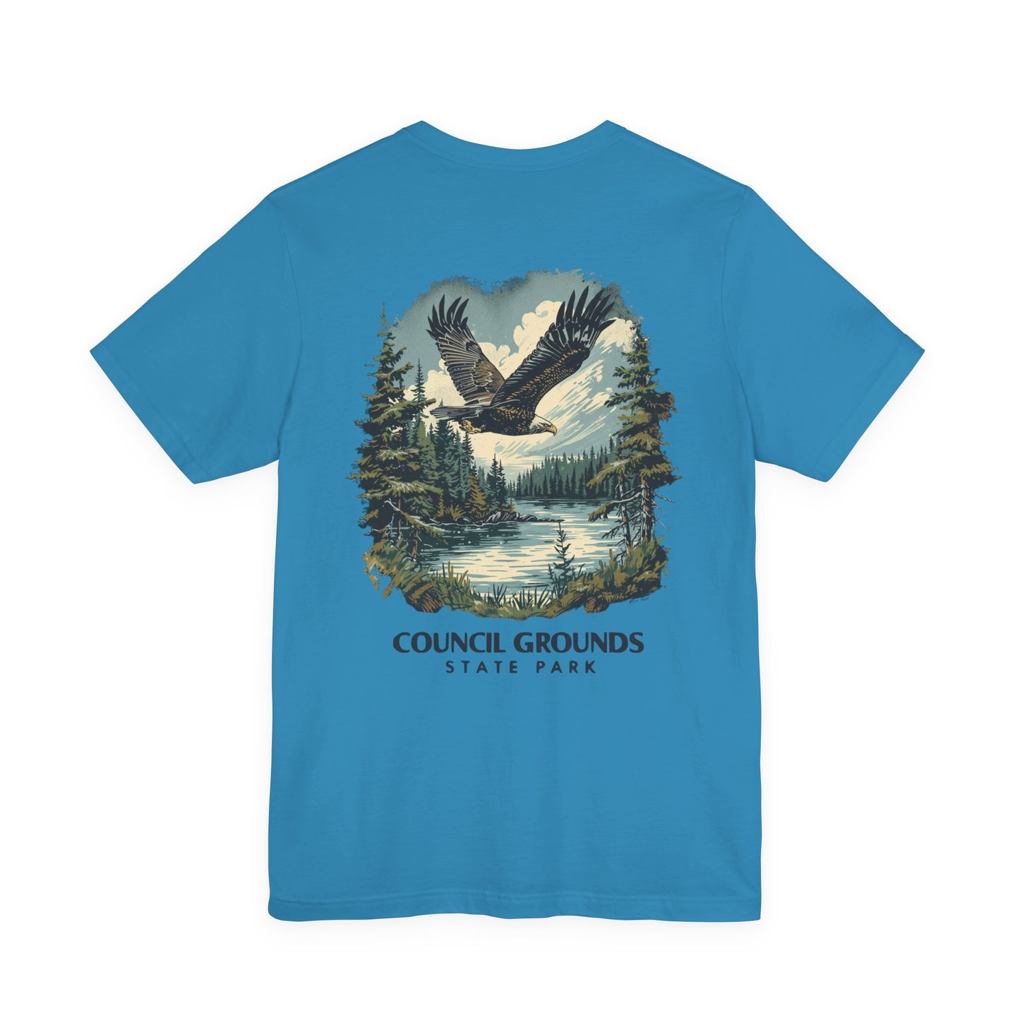 Blue t-shirt with an eagle and forest design on the back, labeled 'Council Grounds State Park'.