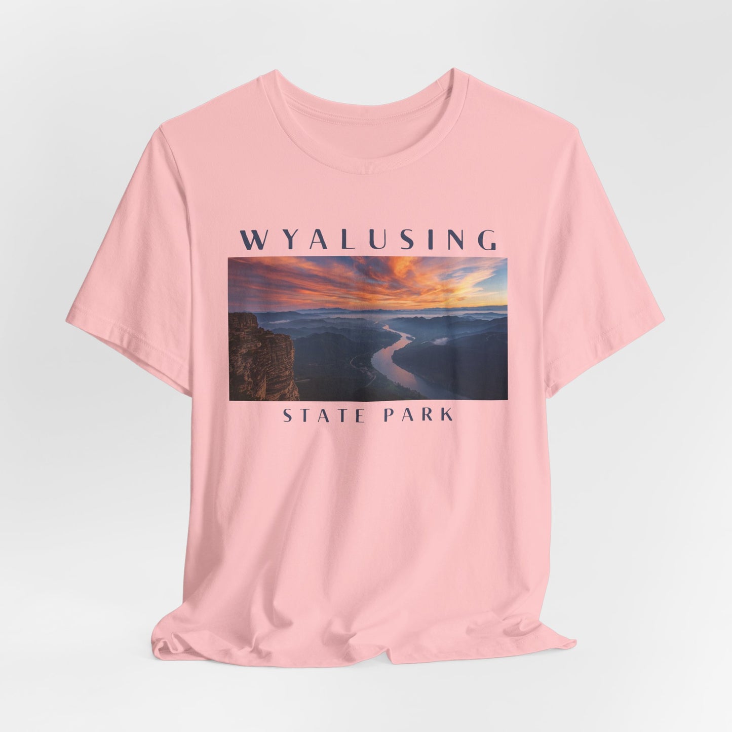 Pink t-shirt with Wyalusing State Park graphic on a light gray background