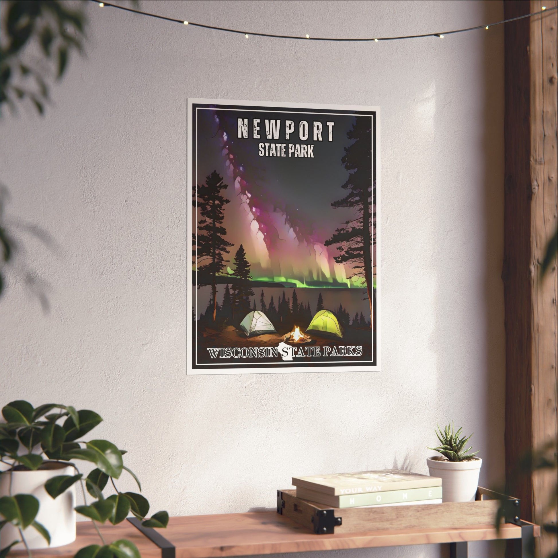 Poster depicting tents along a lakeshore and northern lights in the night sky.