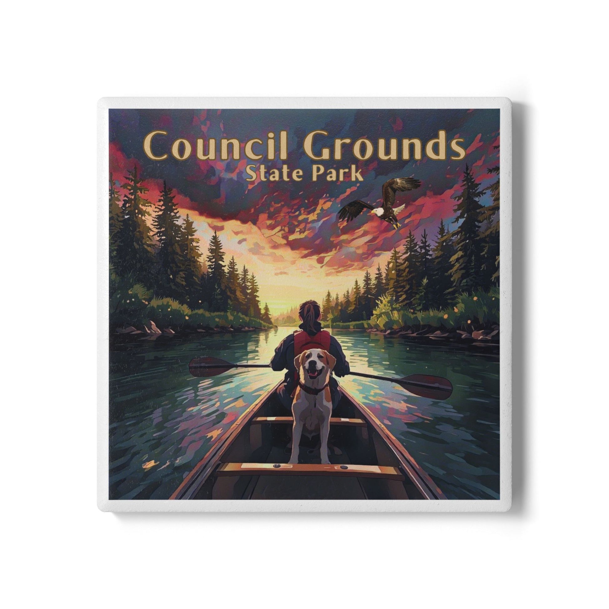 Ceramic coaster design of a person in a canoe with a River at Sunset