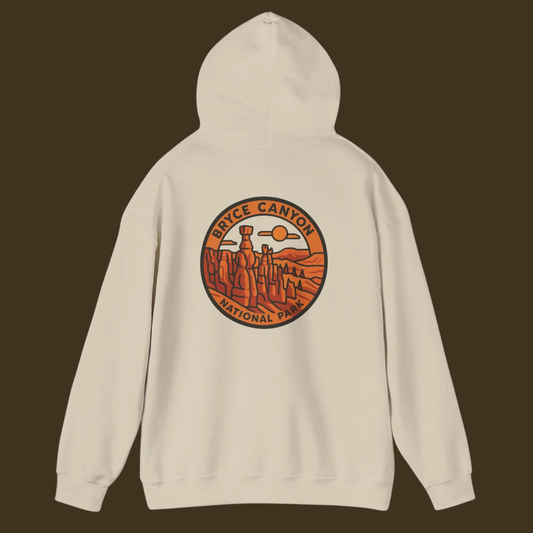 Beige hoodie with Bryce Canyon National Park graphic on the back against a brown background