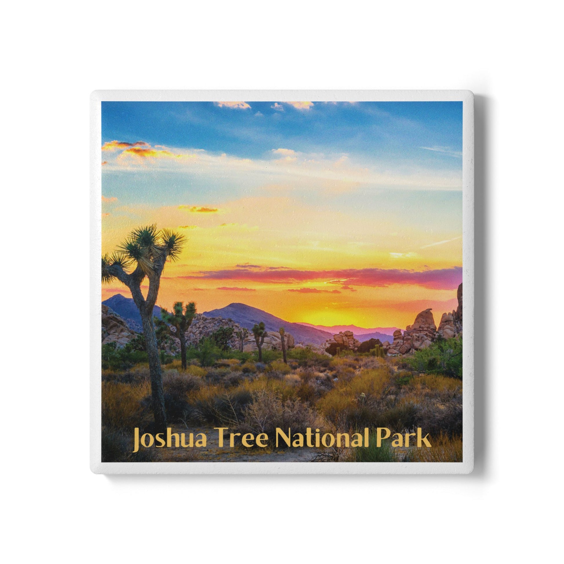 Coaster of a desert landscape with Joshua Tree National Park text