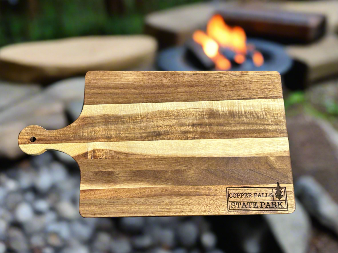 Wood cutting board with Copper Falls State Park Engraving.
