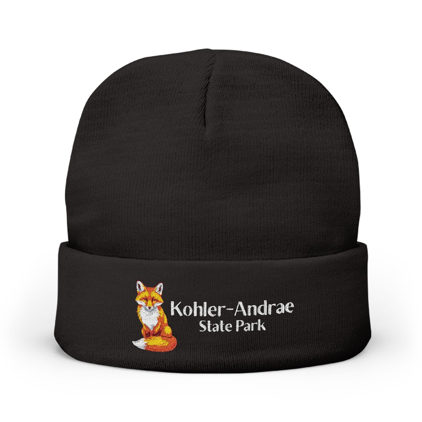Black beanie with a fox design and 'Kohler-Andrae State Park' text on a white background