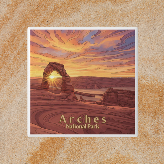Illustration of Arches National Park with a sunset over a sandstone arch.