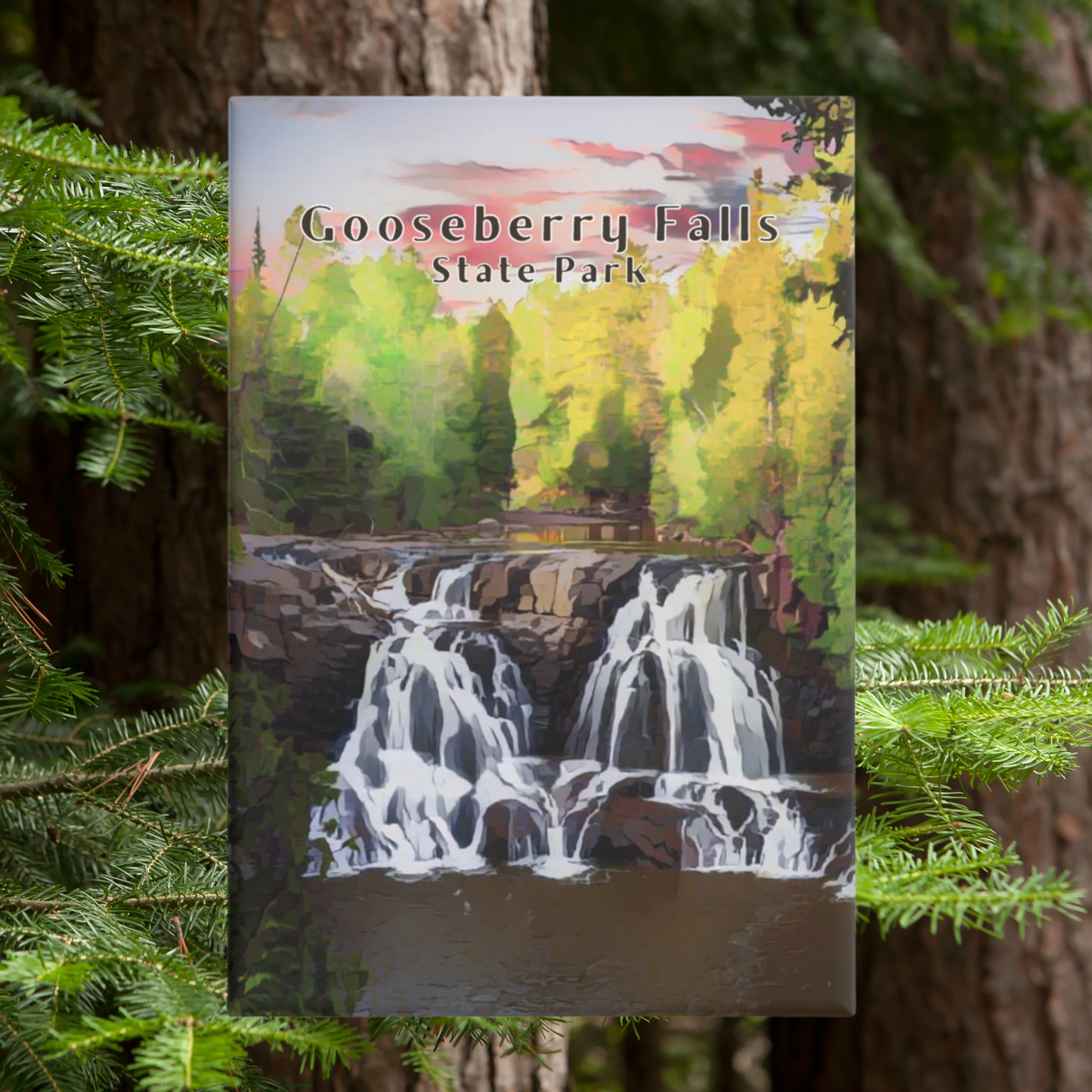 Magnet with a watercolor design of Gooseberry Falls State Park featuring a waterfall and trees.