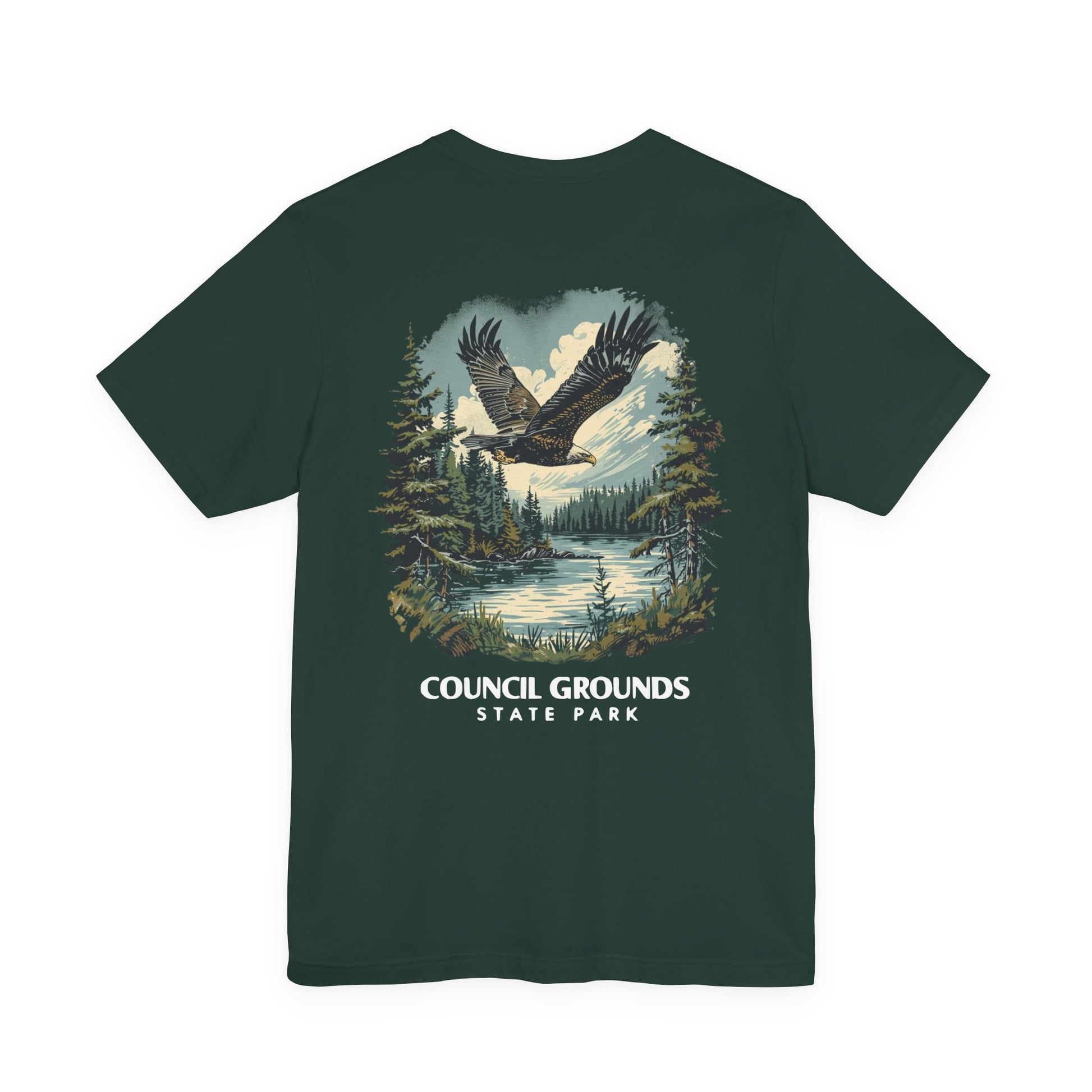 Green t-shirt with an eagle design and 'Council Grounds State Park' text on a white background