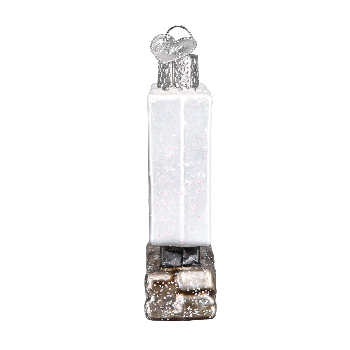 Side view of Hand painted glass ornament in the shape of Yosemite national park entrance sign on a white background.