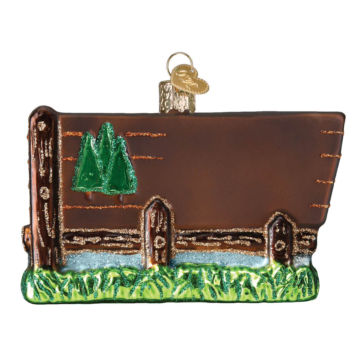 Back view of Glass Christmas ornament in shape of the Yellowstone National Park Entrance sign on a white background. 