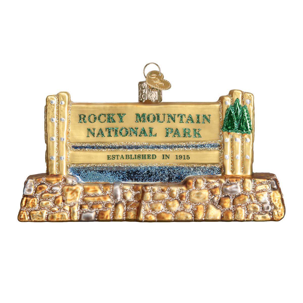 Glass ornament in the shape of the Rocky Mountain national Park entrance sign on a white background.