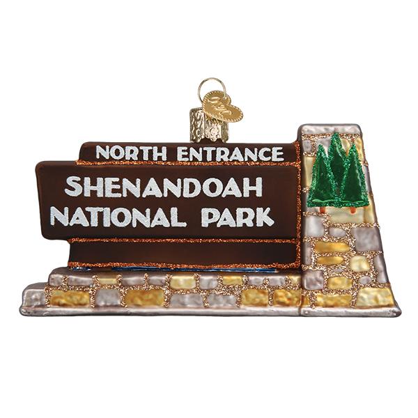 3-D glass ornament in the shape of the Shenandoah national park entrance sign against a white background.