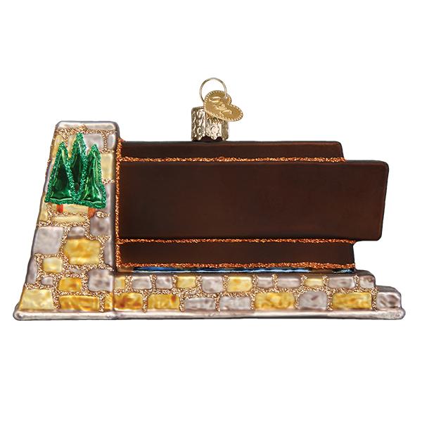 Back view of 3-D glass ornament in the shape of the Shenandoah national park entrance sign against a white background.