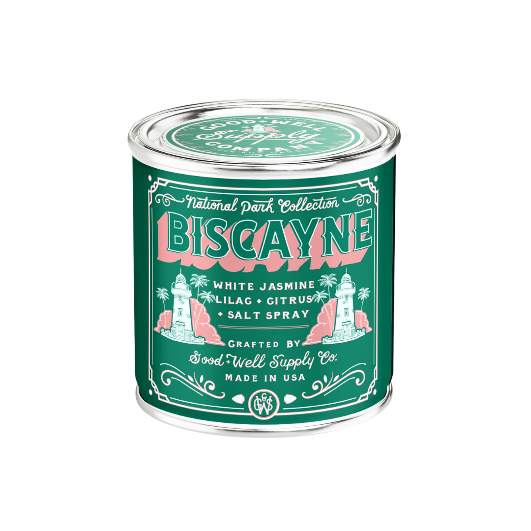 Green candle tin labeled 'Biscayne' with decorative design on a white background