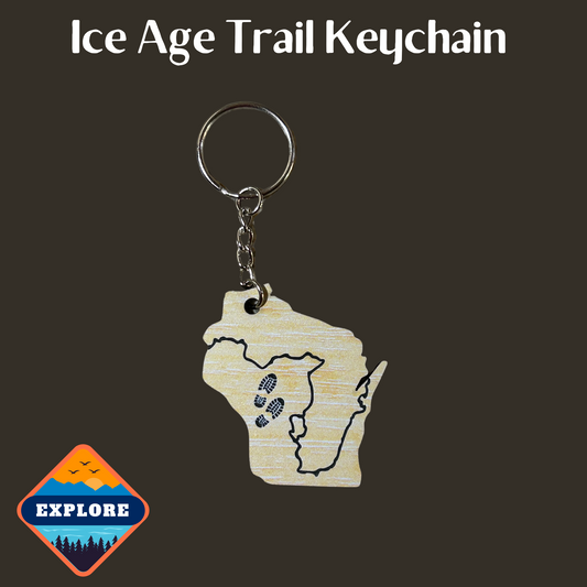 Acrylic Wisconsin shaped keychain with the Ice Age Trail route engraved on it and a pair of boot tracks.