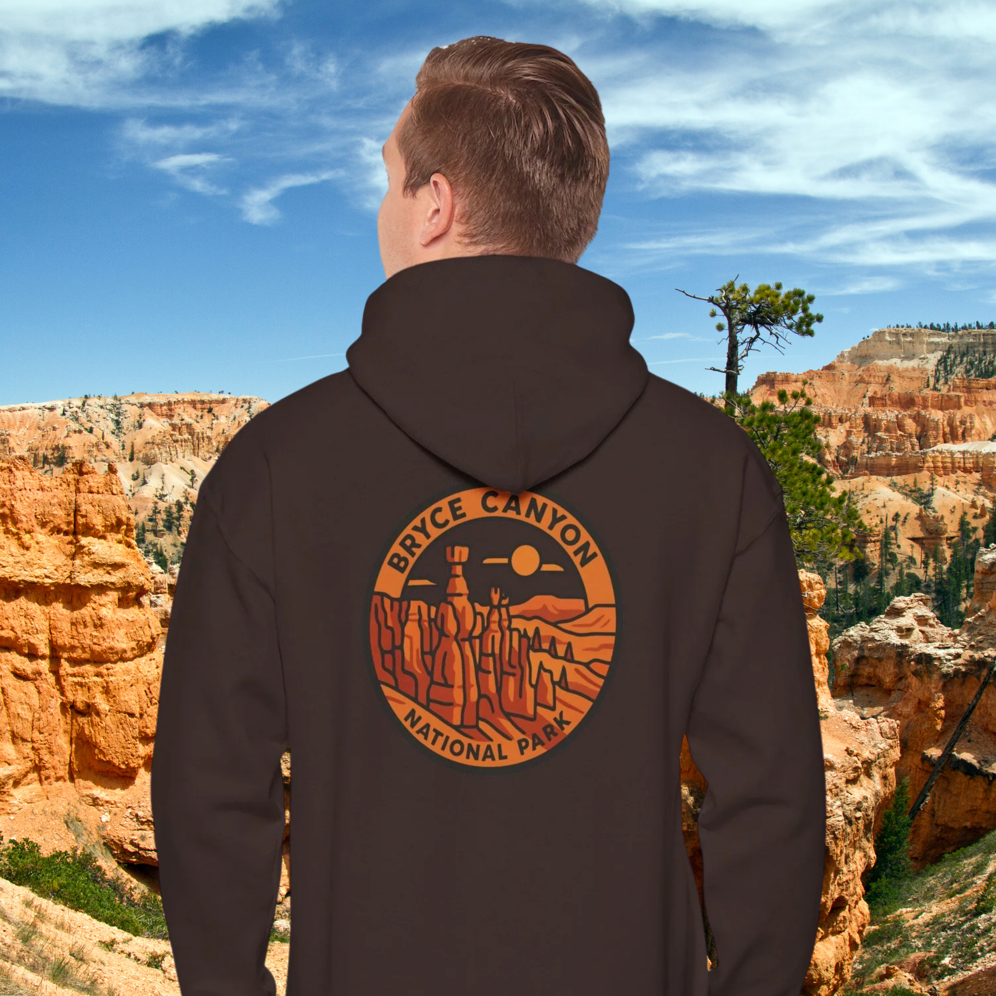 Person wearing a hoodie with Bryce Canyon National Park logo against a scenic background