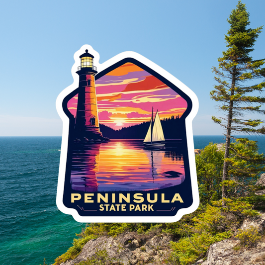 Diecut sticker featuring a lighthouse towering above a calm lake reflecting a vibrant sunset and a sailboat on the water.  Features the text Peninsula State Park.  Photo background: vegetation on a rock ledge over a large body of water. 