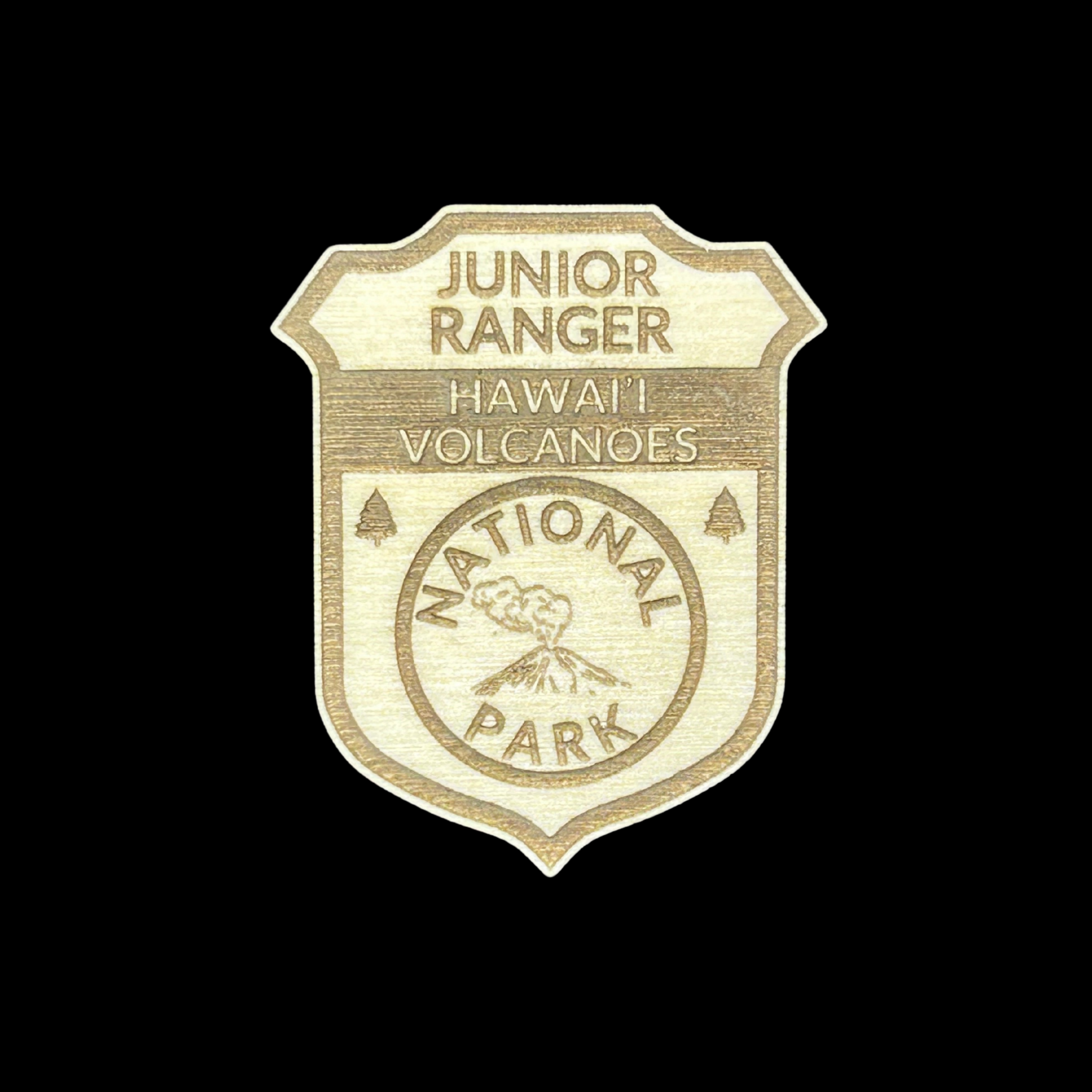 Junior Ranger badge for Hawaii Volcanoes National Park on a black background