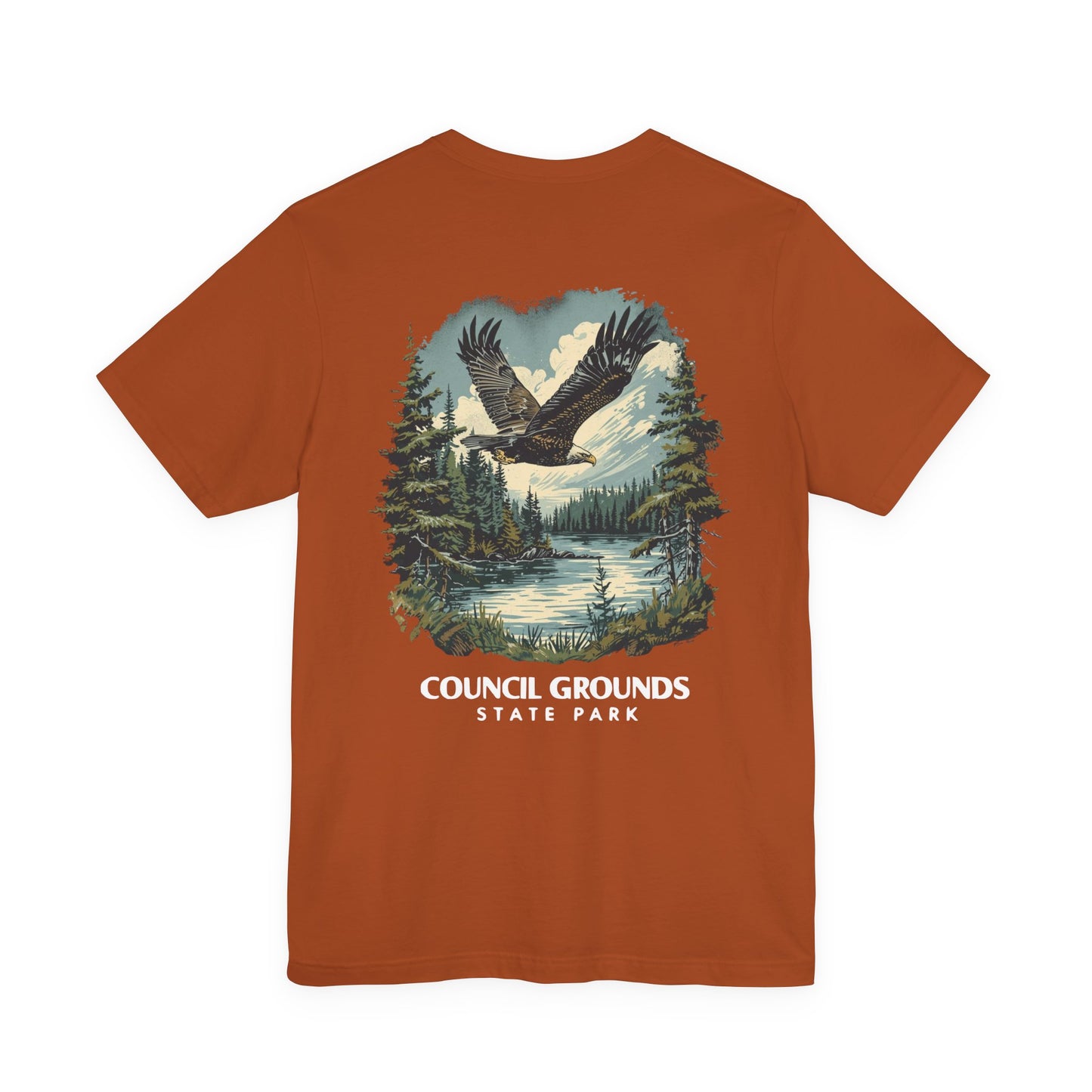 Brown t-shirt with eagle and forest graphic and 'Council Grounds State Park' text on a white background