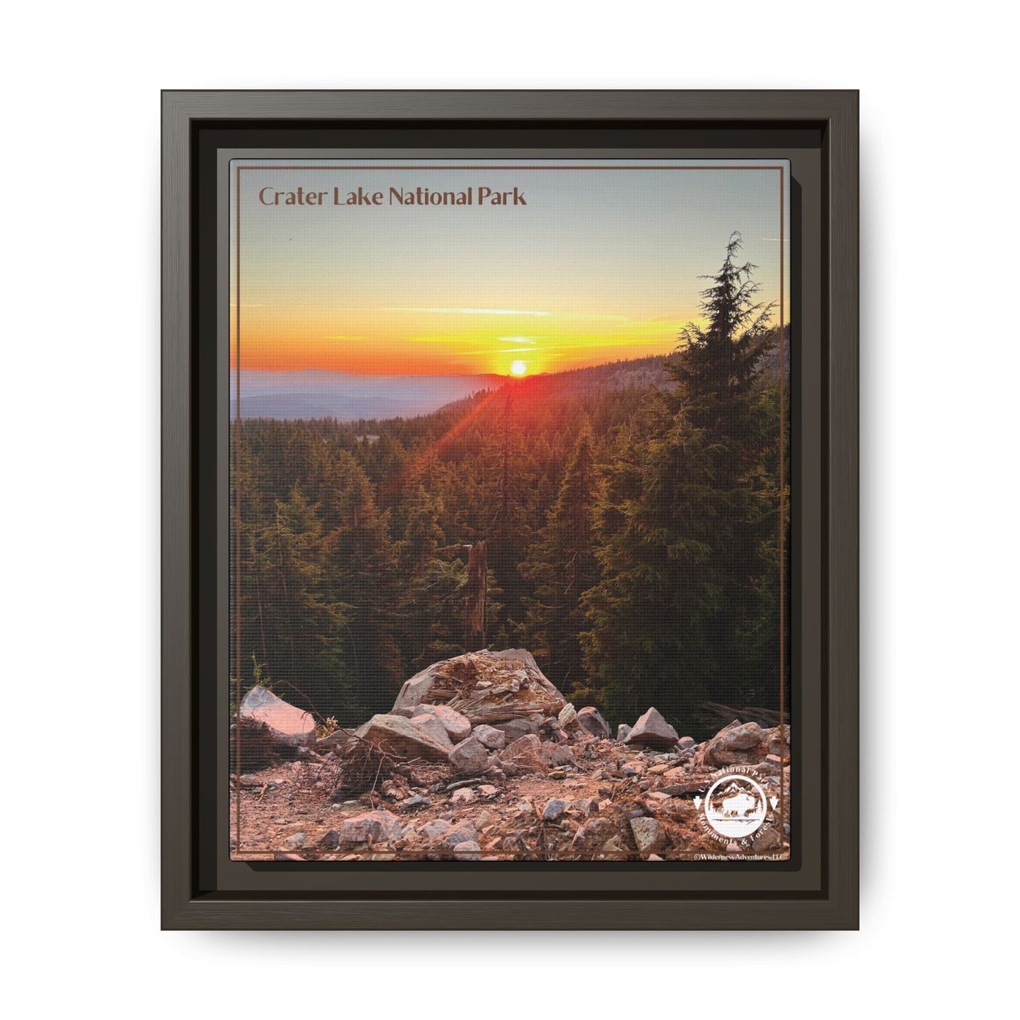Espresso framed canvas print depicting a Majestic sunset over forested mountains at Crater Lake National Park.