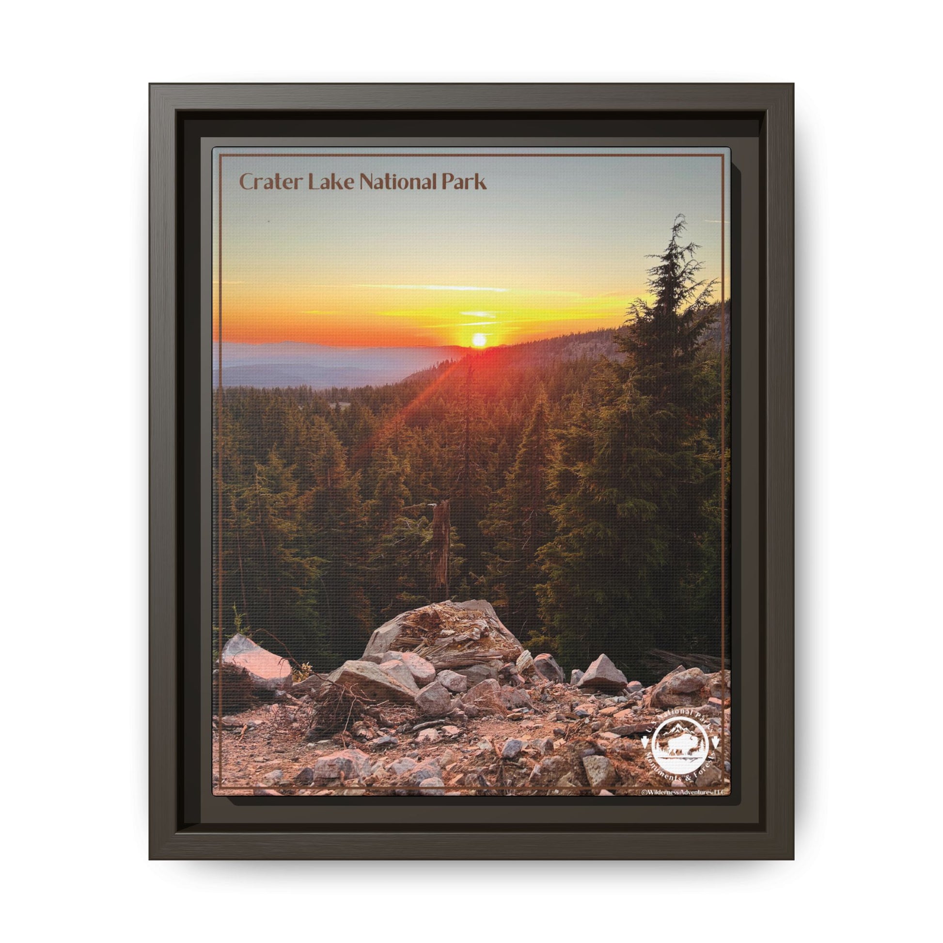 Espresso framed canvas print depicting a Majestic sunset over forested mountains at Crater Lake National Park.