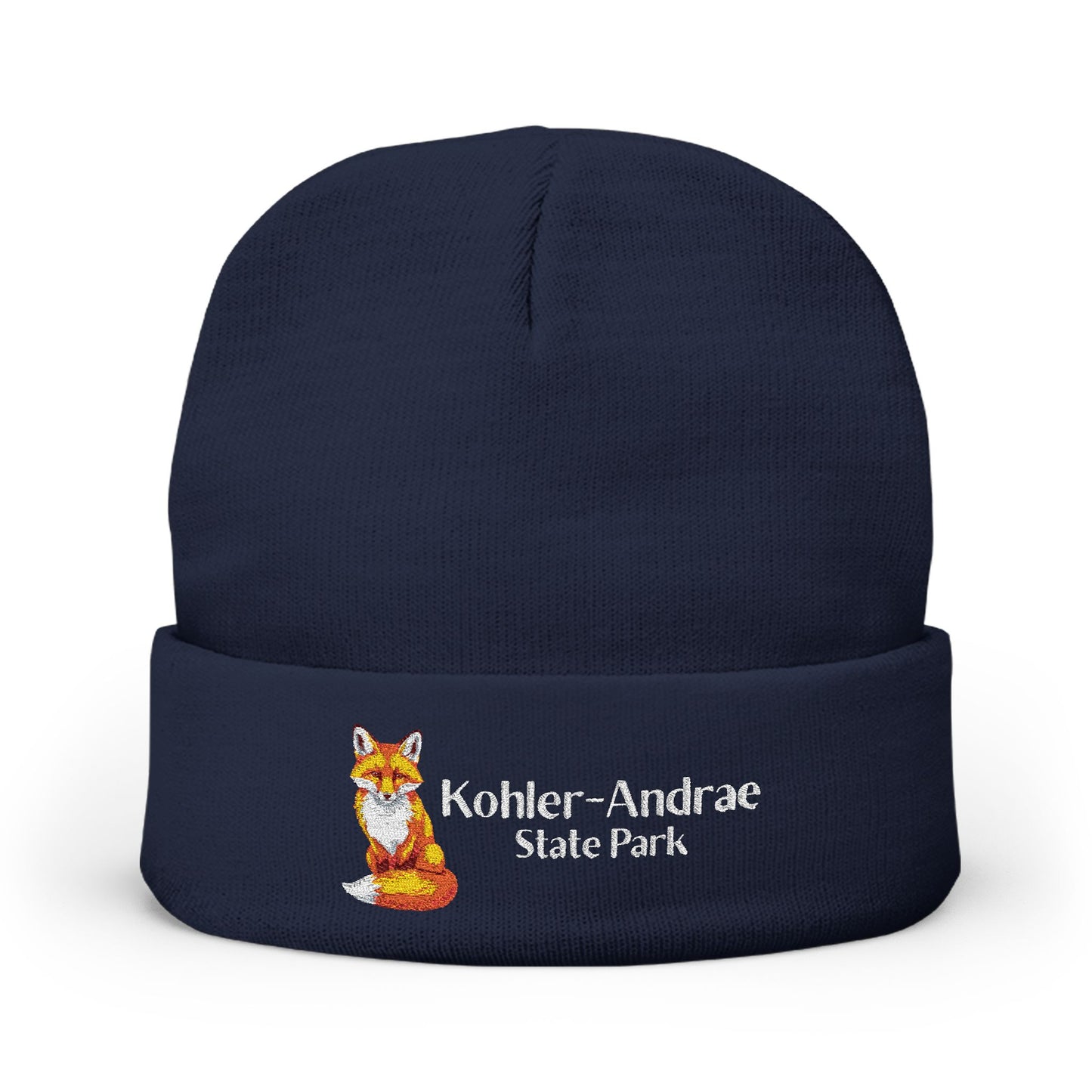 Dark navy beanie with a fox illustration and 'Kohler-Andrae State Park' text on a white background
