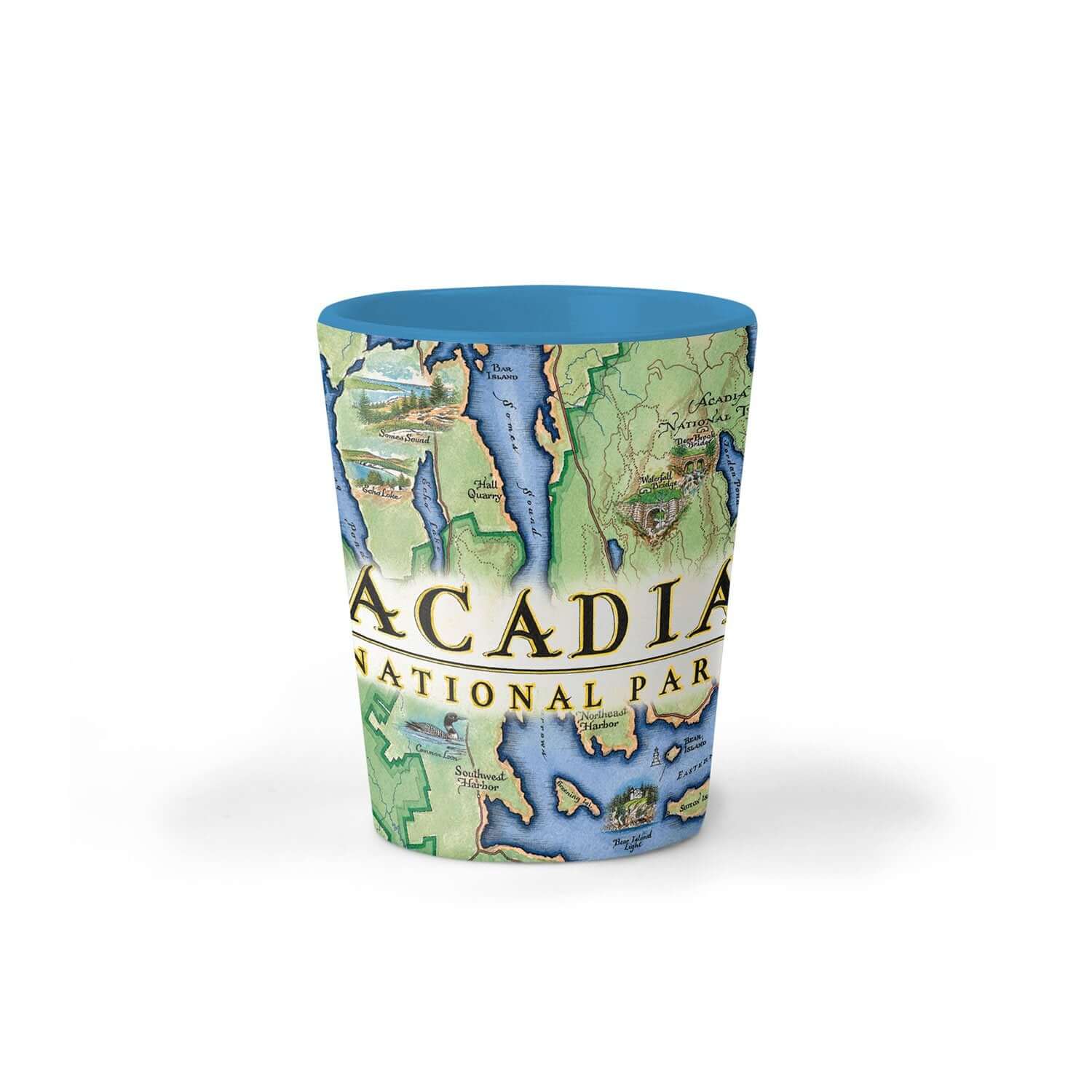 A ceramic shot glass featuring a vintage-style map print of Acadia National Park, with a solid blue interior and rim, set against a plain white background.