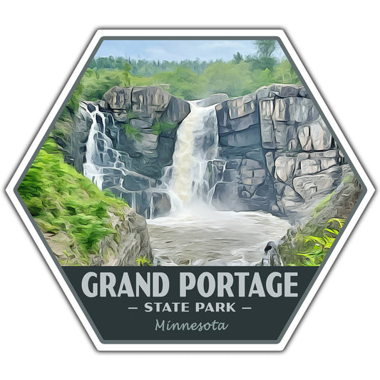 A hexagonal sticker or label featuring an illustrated waterfall landscape labeled 'GRAND PORTAGE - STATE PARK - Minnesota'. The artwork shows gray rock cliffs, green foliage, and white water, with a dark gray bottom band containing the text.