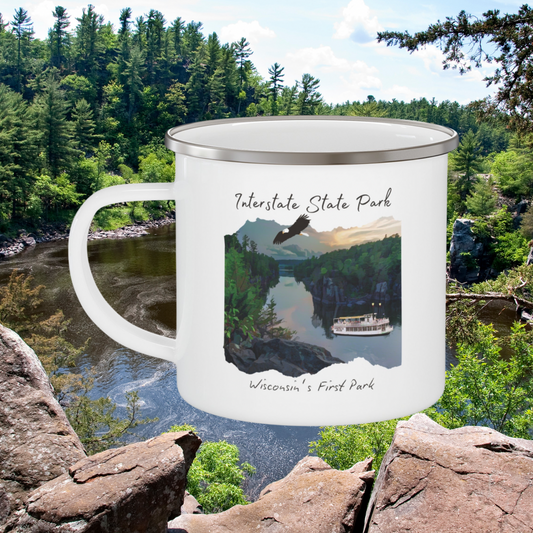 White enamel mug depicting the St Croix River at sunset with an eagle flying above and a paddle wheel boat on the river.  Photo background: St. Croix River.